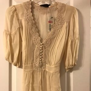 Feminine and delicate BCBG blouse